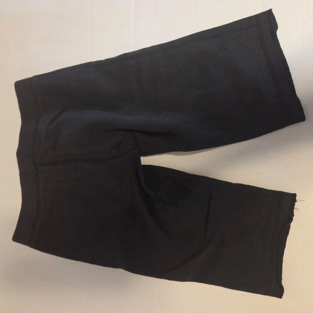 Super cozy black Hanes sweat shorts featuring a vibran